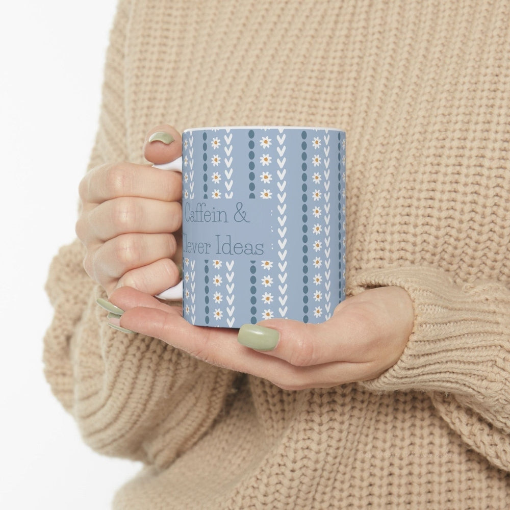 funny blue and white floral mug with typography "Caffein and Clever Ideas".